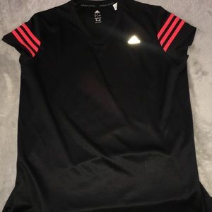 black and pink adidas shirt size large in women :)